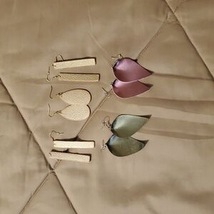 5 pair leather like earrings.